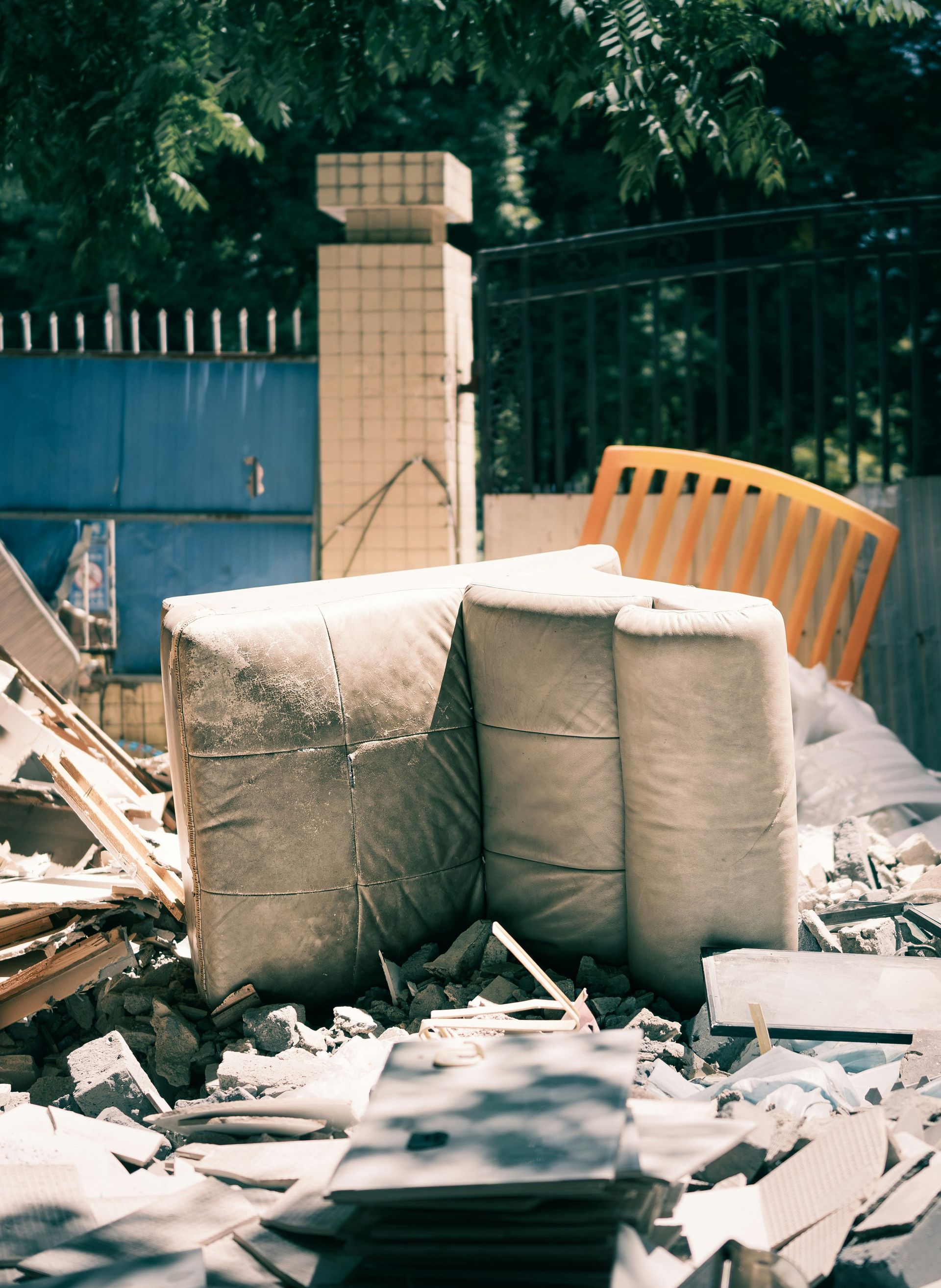 Debris and large wrapped objects in a construction site.